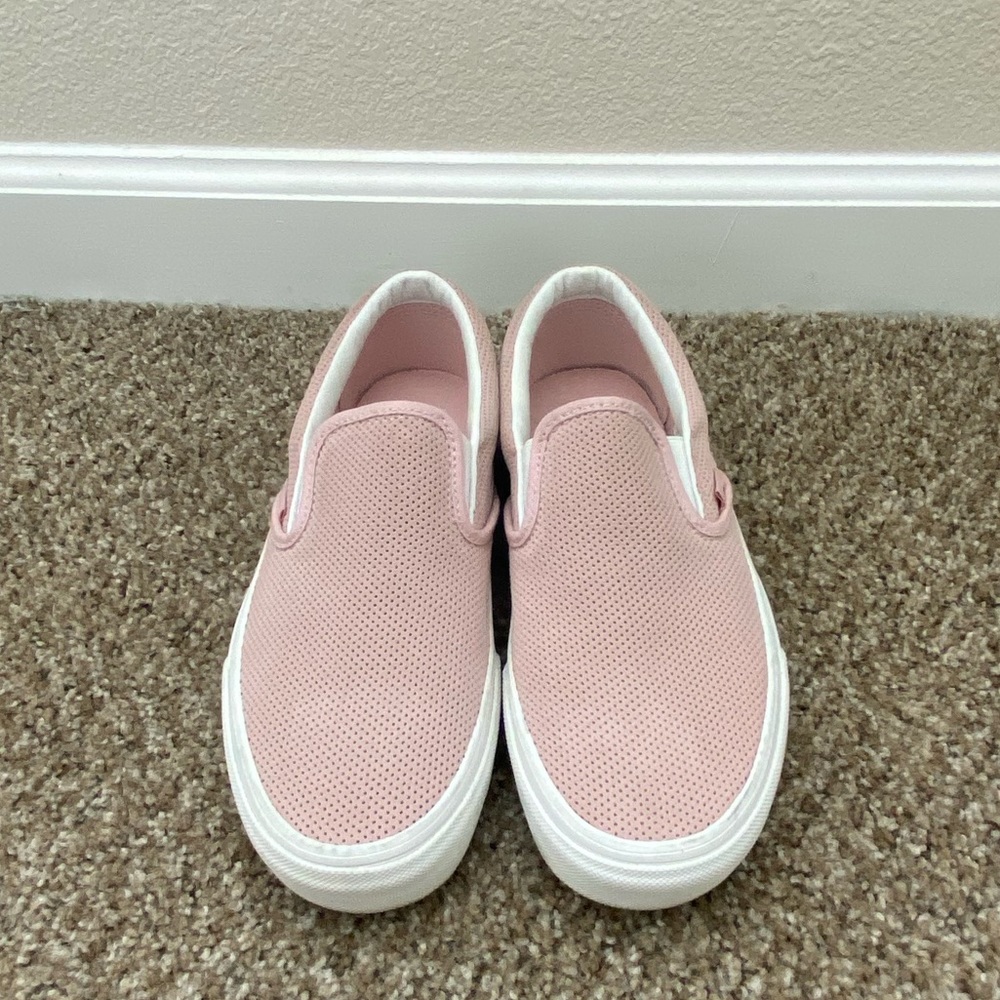 Pink and white perforated suede Vans